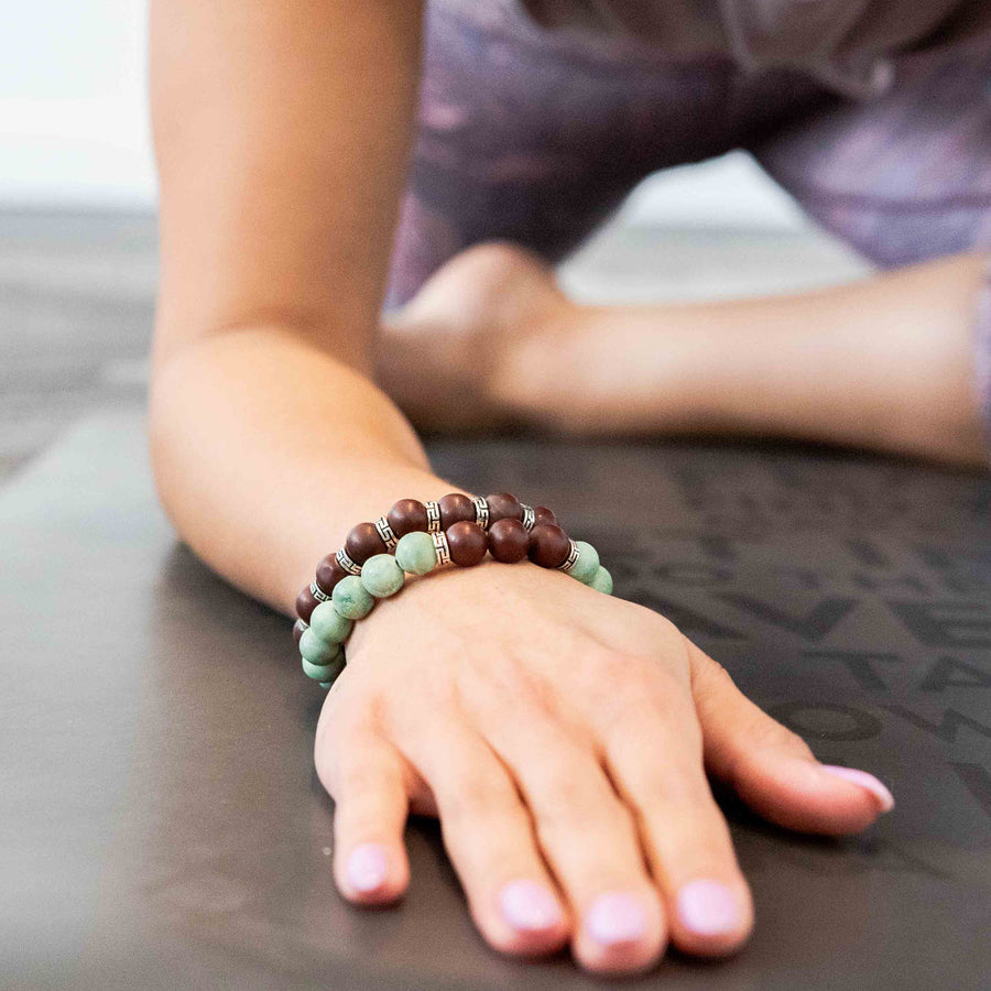 red jasper healing gemstones bracelet on wrist